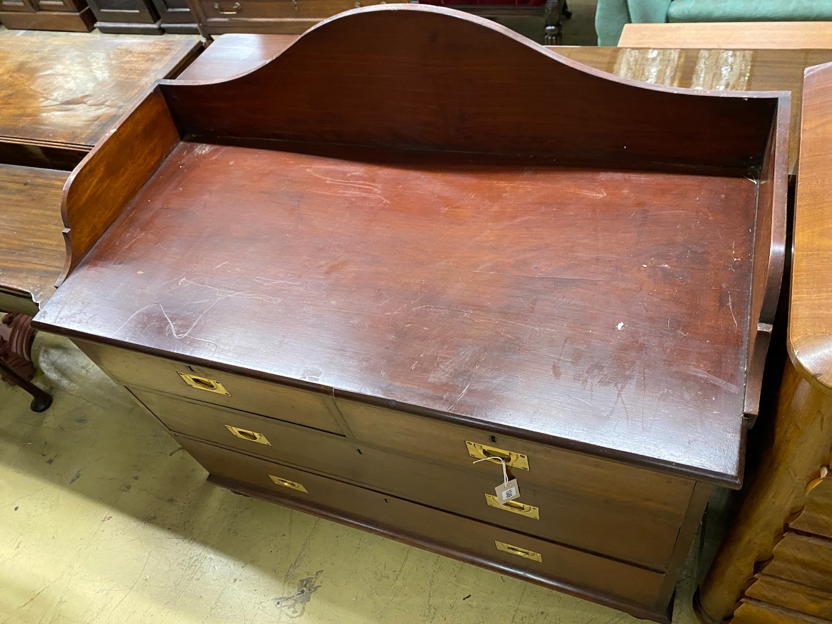 A Victorian military style mahogany wash stand, width 114cm, depth 54cm, height 109cm